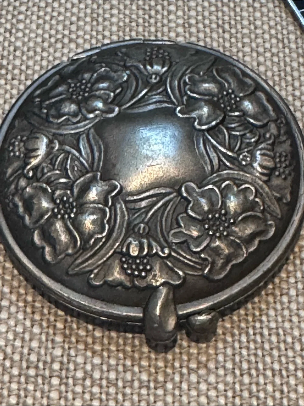 Ornate round silver color antique purse mirror